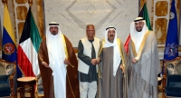 PROFESSOR YUNUS MEETS AMIR OF KUWAIT